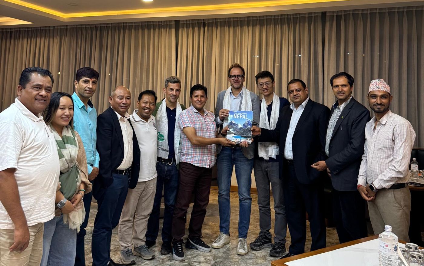 Frédéric Kauffmann with a group of participants at a meeting in Nepal